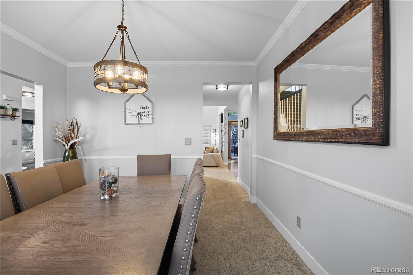35 Ravenglass Way Colorado Springs, CO 80906 - Photo 16 of 45 a view of a dining room with furniture
