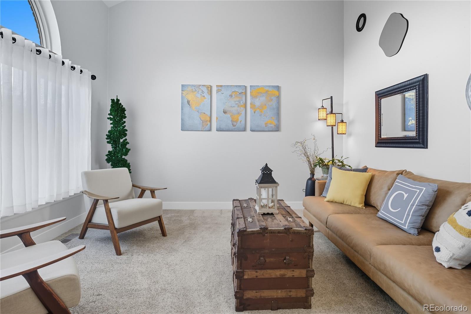 35 Ravenglass Way Colorado Springs, CO 80906 - Photo 17 of 45 a living room with furniture and wooden floor