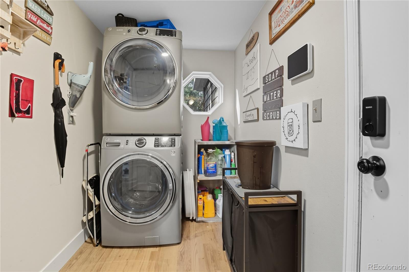 35 Ravenglass Way Colorado Springs, CO 80906 - Photo 22 of 45 a utility room with dryer and washer