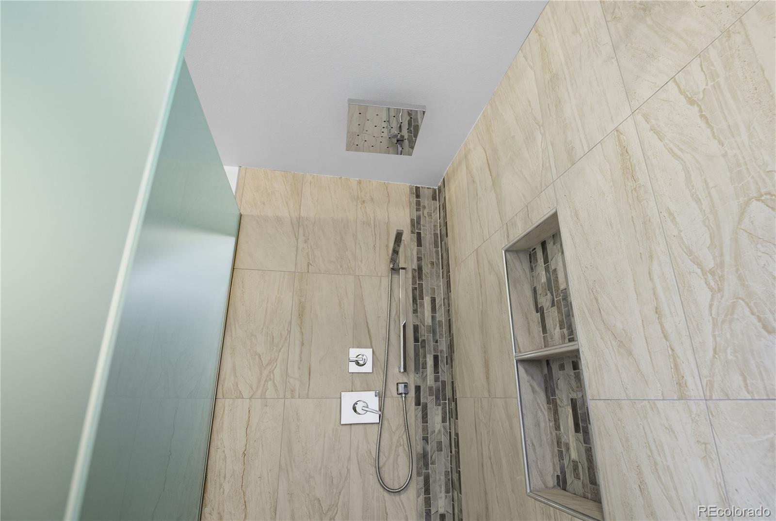 35 Ravenglass Way Colorado Springs, CO 80906 - Photo 28 of 45 a bathroom with a shower