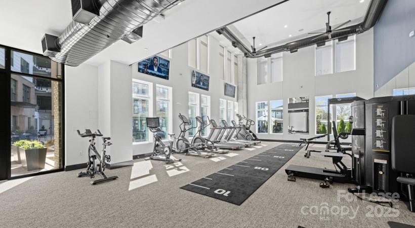 4312 Yancey Road, Unit B3 Charlotte, NC 28217 - Photo 6 of 48 a view of gym equipment and windows