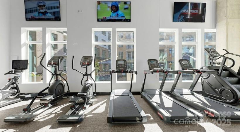 4312 Yancey Road, Unit B3 Charlotte, NC 28217 - Photo 7 of 48 a view of a room with gym equipment