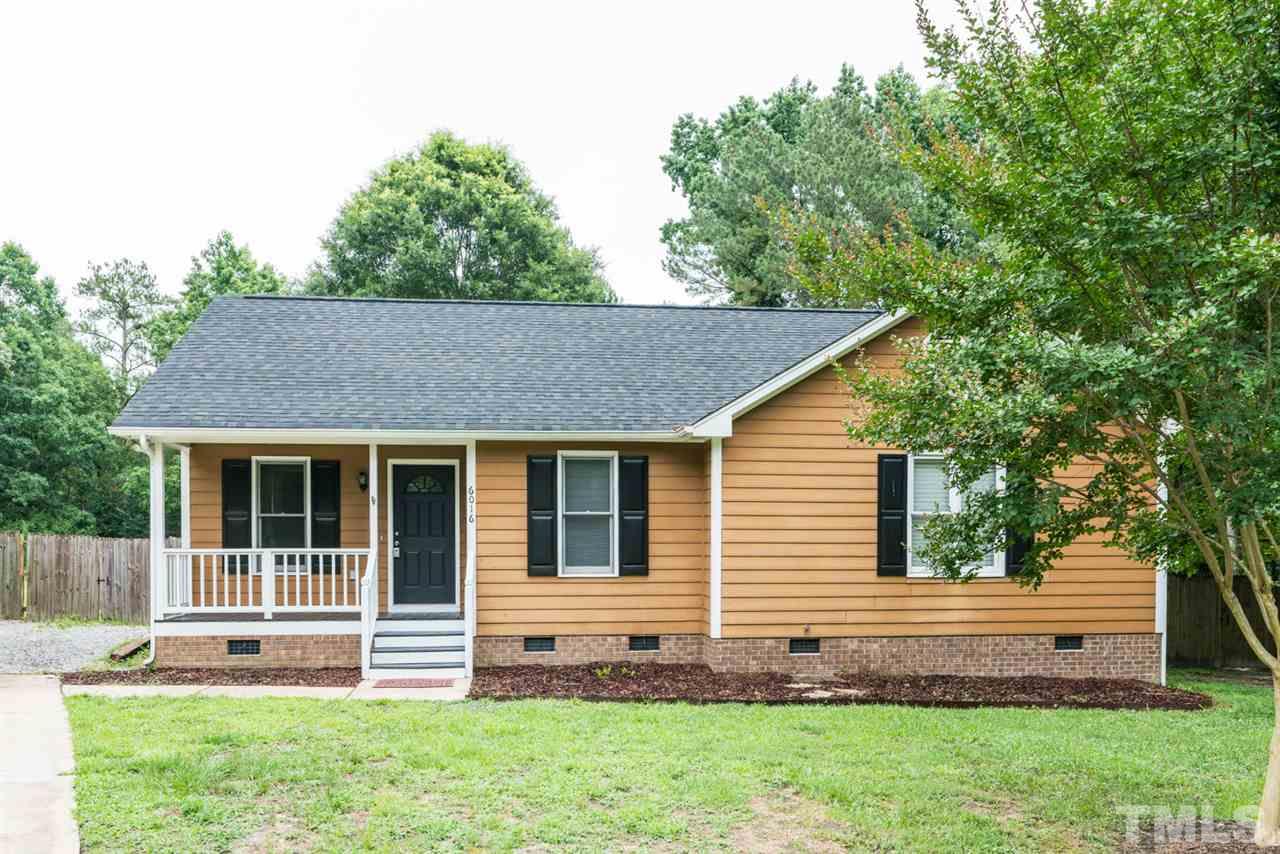 6016 Shadow Moss Circle Raleigh, NC 27603 - Photo 1 of 16 a view of front of a house with a yard