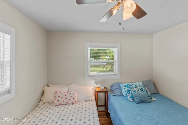 a en suite bathroom with a sink and a mirror