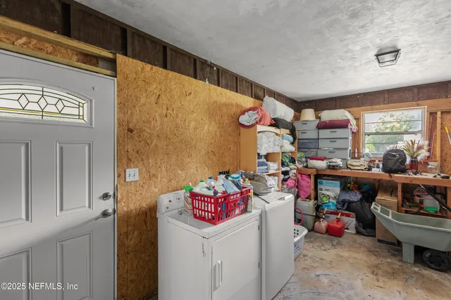 a view of a swimming pool with a yard