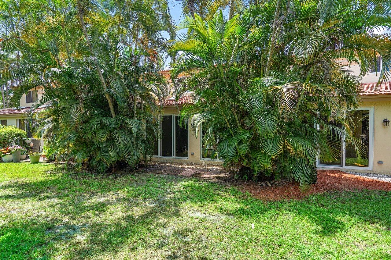 6684 Via Regina Boca Raton, FL 33433 - Photo 17 of 19 a view of a house with a yard