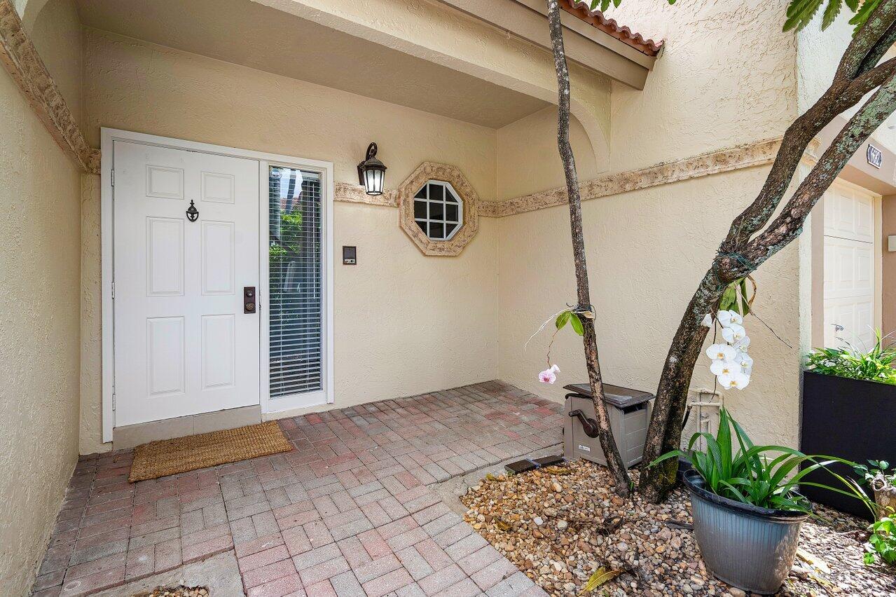 6684 Via Regina Boca Raton, FL 33433 - Photo 2 of 19 a view of an entryway