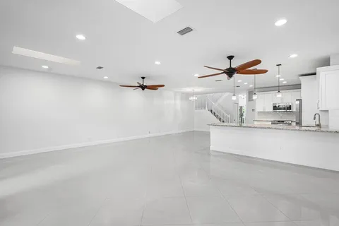 a view of a kitchen and window