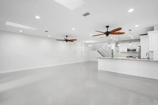 a view of a kitchen and window