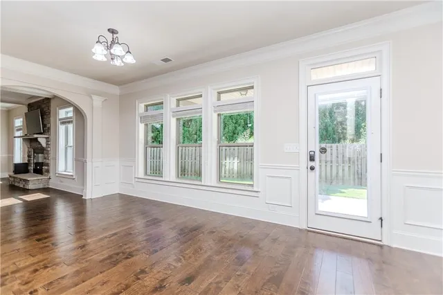 a bathroom with a sink mirror and toilet