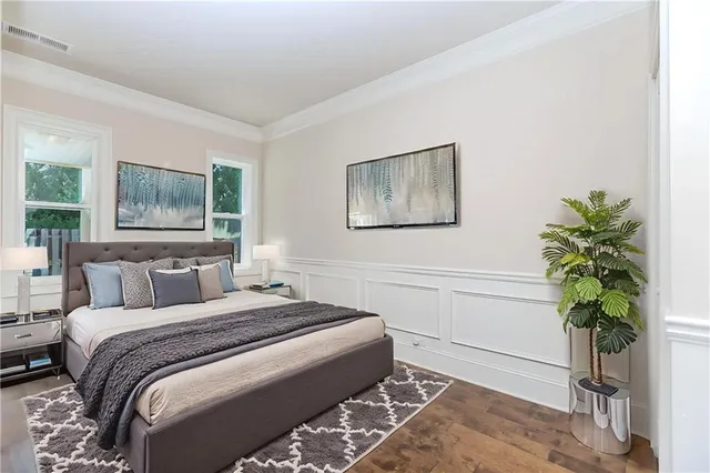 an empty room with windows and entrance