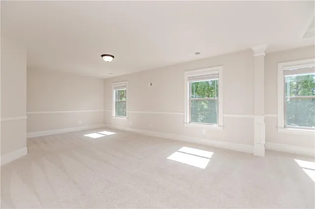 an empty room with windows