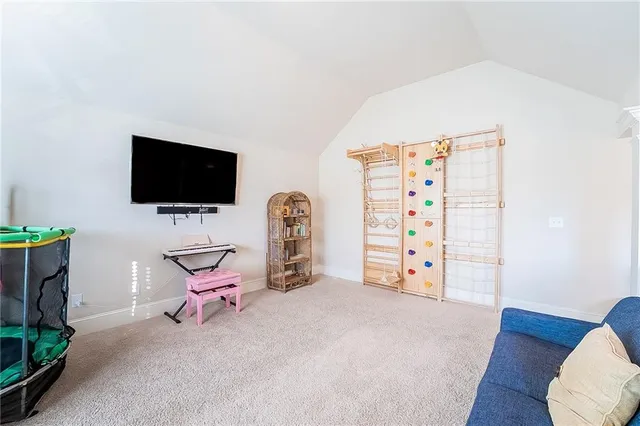an aerial view of a house with a swimming pool yard and outdoor seating