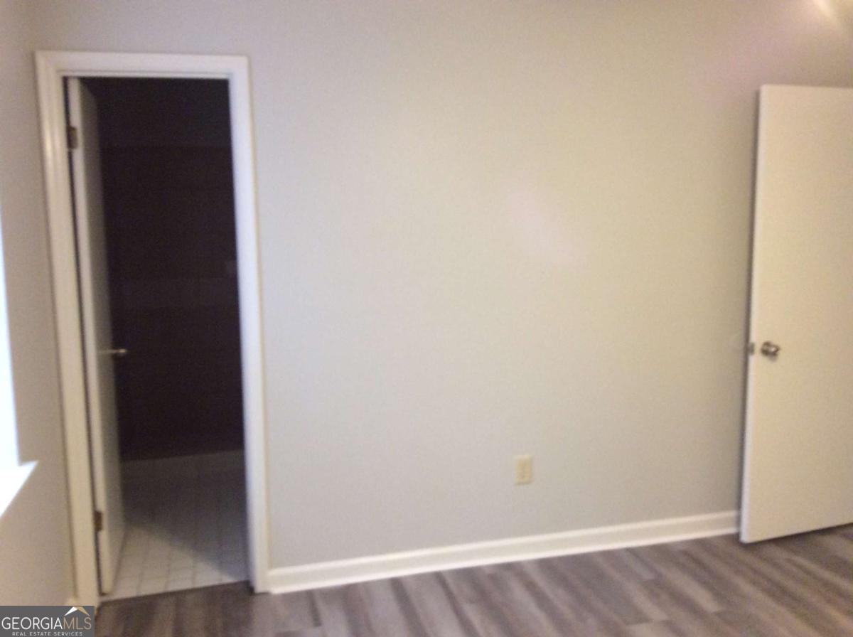 106 Richard Way Stockbridge, GA 30281 - Photo 15 of 15 wooden floor in an empty room