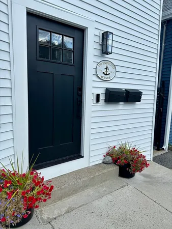 a view of a entryway door front of a house