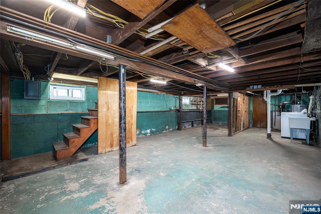 46 East 16th Street Bayonne, NJ 07002 - Photo 14 of 24 a view of an empty room with wooden floor