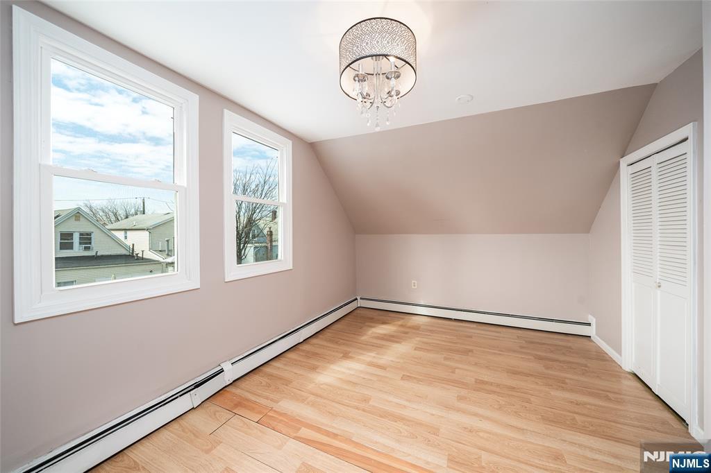 46 East 16th Street Bayonne, NJ 07002 - Photo 18 of 24 a view of empty room with window