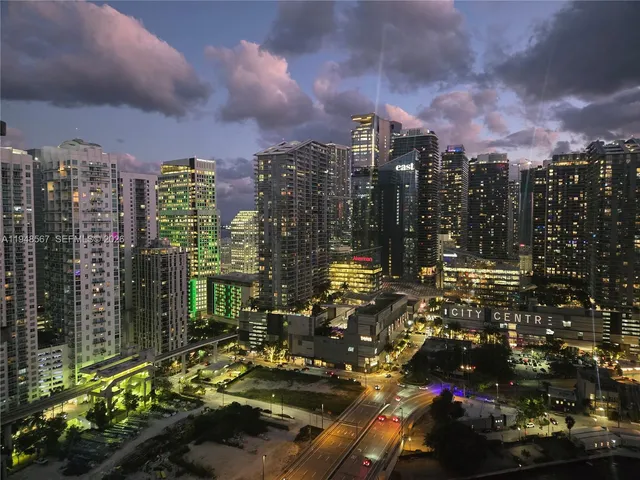 a view of city with tall buildings