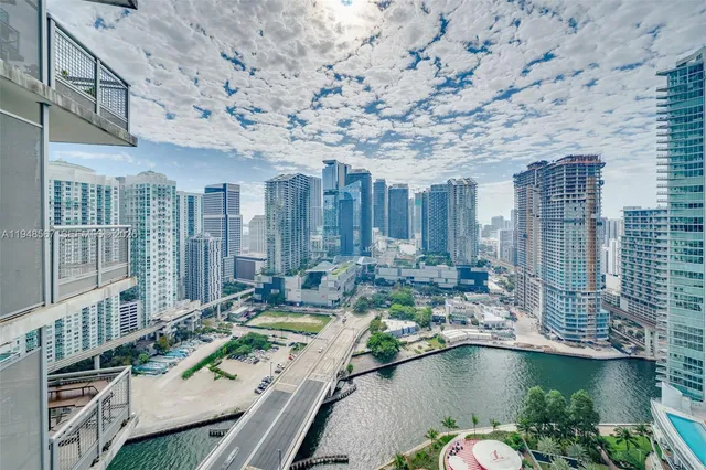a view of city with tall buildings