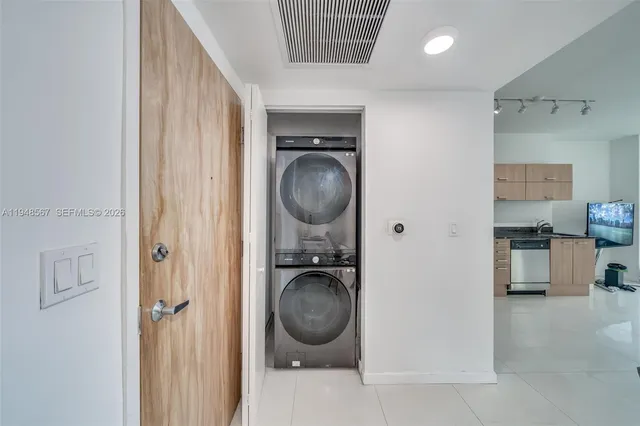 a view of living room washer and dryer
