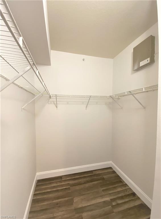 7960 Preserve Circle, Unit 616 Naples, FL 34119 - Photo 13 of 20 a view of an empty walk in closet