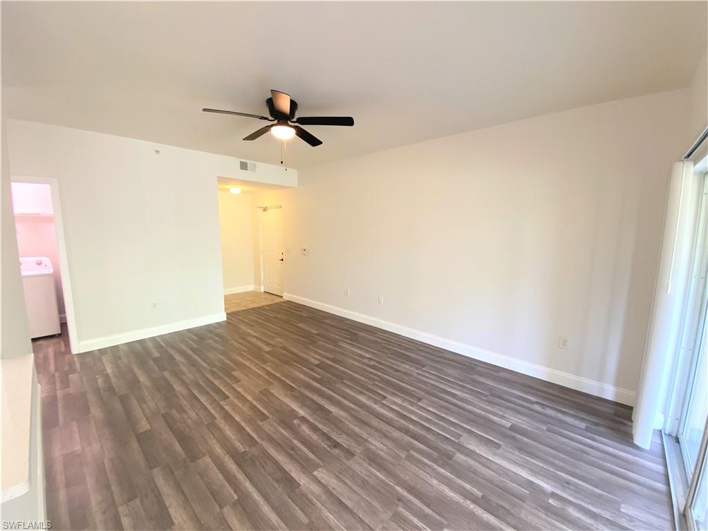 7960 Preserve Circle, Unit 616 Naples, FL 34119 - Photo 3 of 20 wooden floor in an empty room