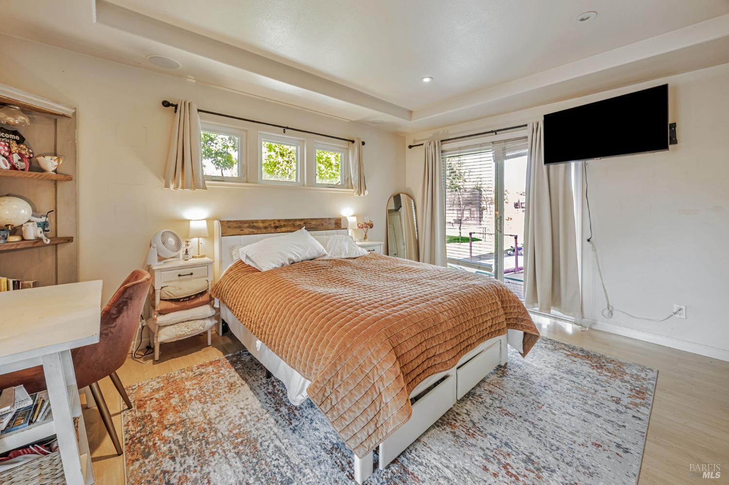 4100 Bisordi Lane Fulton, CA 95439 - Photo 36 of 75 a bedroom with a bed a flat screen tv and a large window