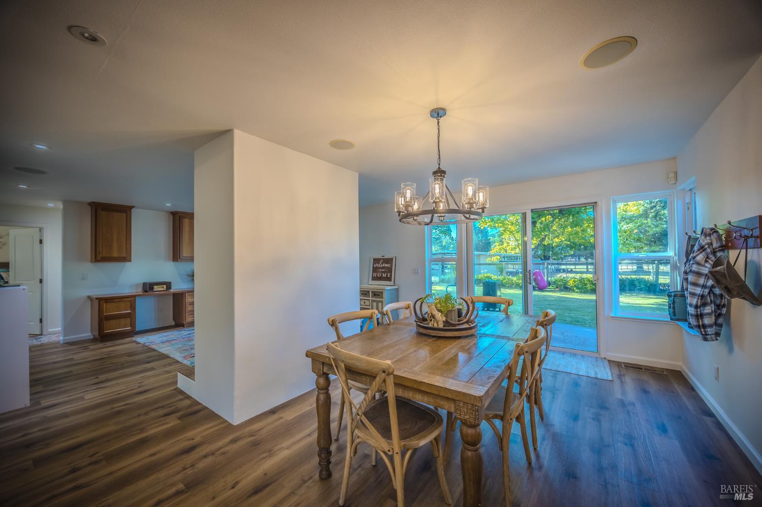 4100 Bisordi Lane Fulton, CA 95439 - Photo 49 of 77 a view of a dining room with furniture window and wooden floor