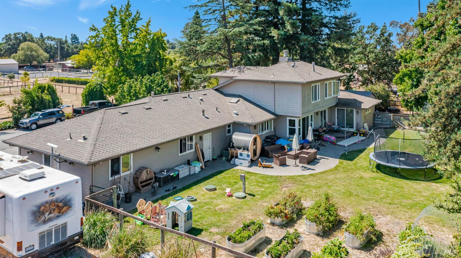 4100 Bisordi Lane Fulton, CA 95439 - Photo 62 of 75 an aerial view of a house with swimming pool and large trees
