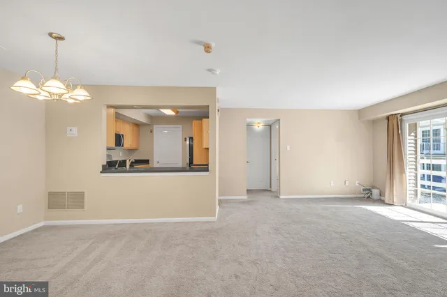 a view of a livingroom with a chandelier
