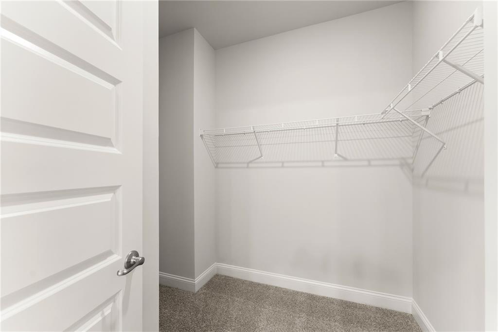 661 Forest Way Cornelia, GA 30531 - Photo 23 of 45 a view of a room with racks on the wall