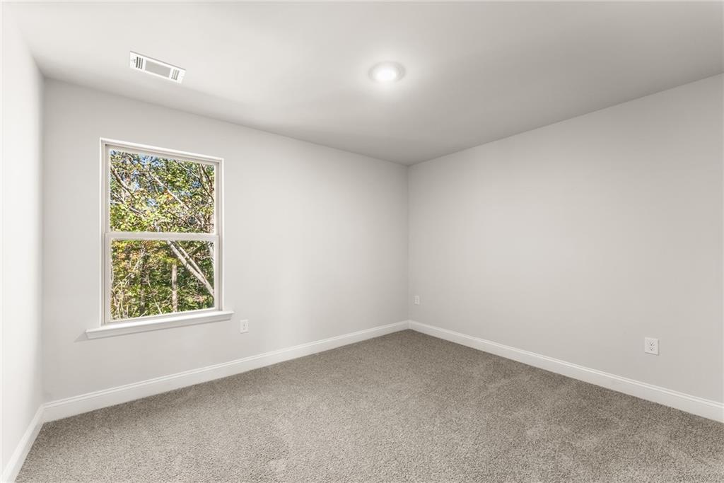 661 Forest Way Cornelia, GA 30531 - Photo 35 of 45 an empty room with a window