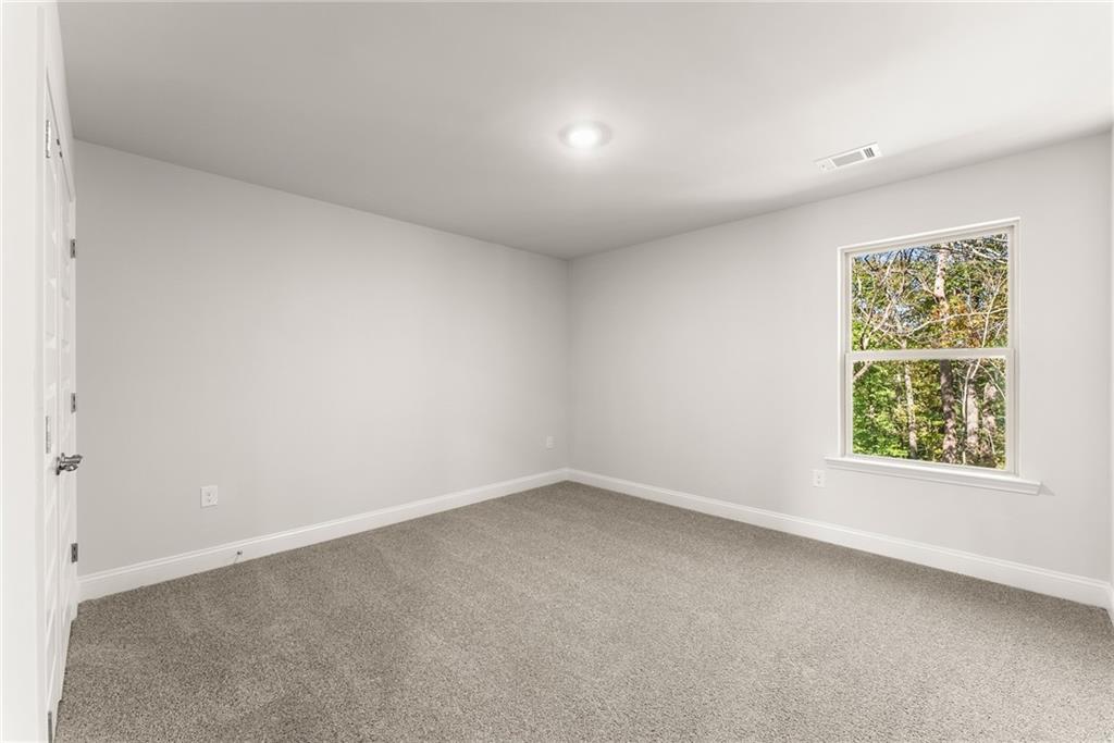 661 Forest Way Cornelia, GA 30531 - Photo 36 of 45 an empty room with a window