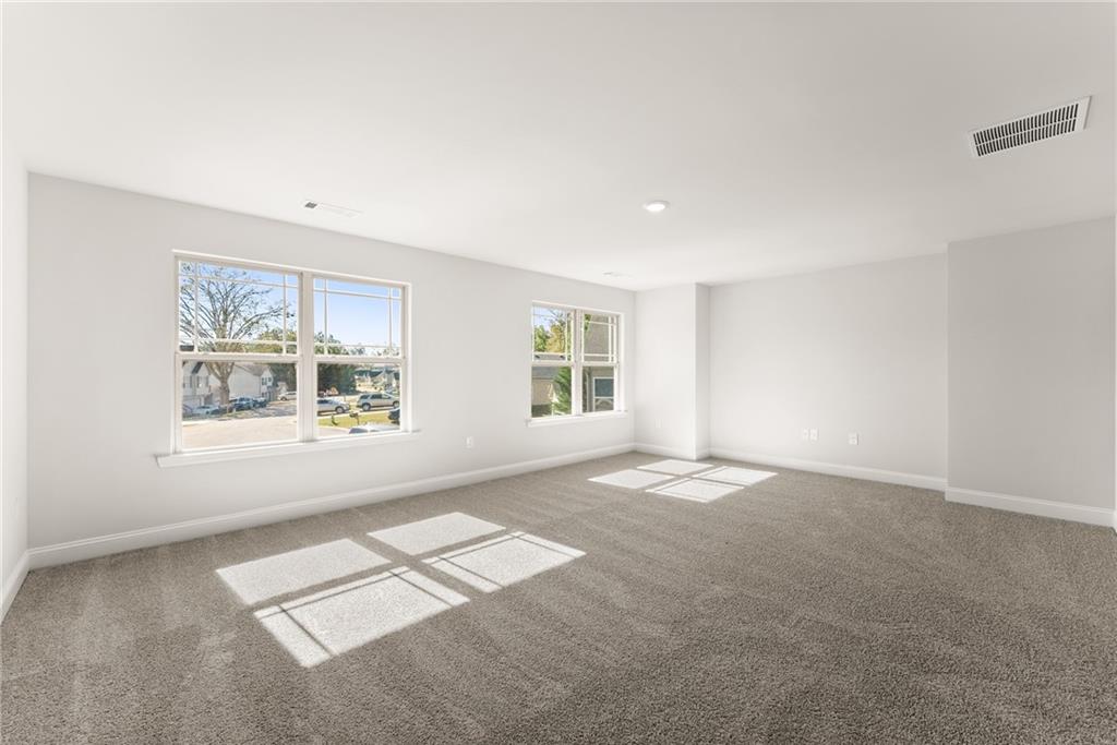 661 Forest Way Cornelia, GA 30531 - Photo 39 of 45 an empty room with windows