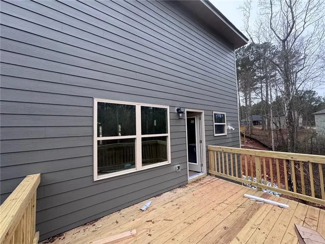 a view of a house with a large window