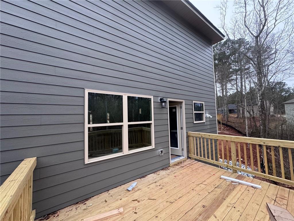 661 Forest Way Cornelia, GA 30531 - Photo 4 of 45 a view of a house with a large window