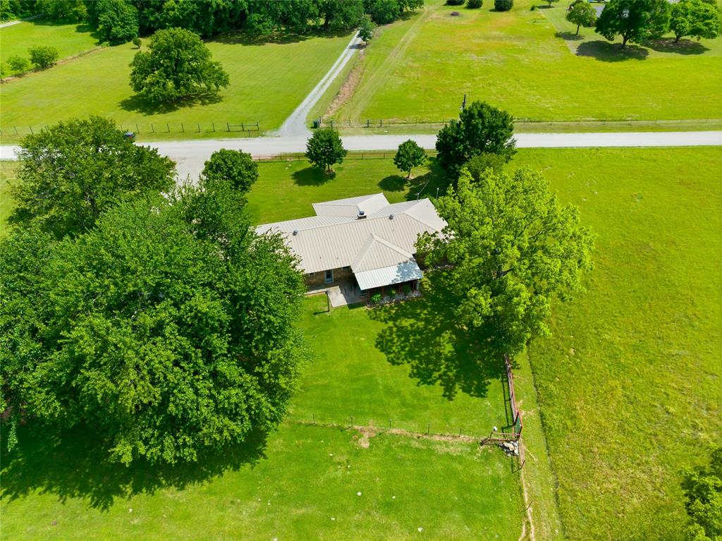235 Magnus Road Denison, TX 75021 - Photo 12 of 35 a view of a garden