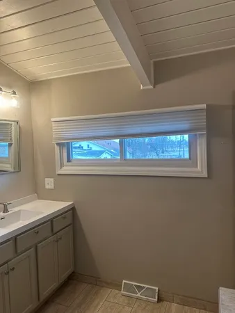 a view of a backyard of a house