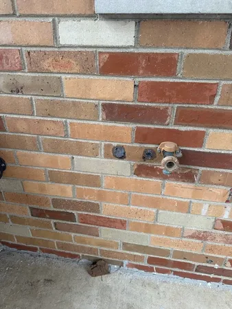 a large kitchen with cabinets and stainless steel appliances