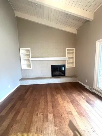 a kitchen with a sink stainless steel appliances and cabinets