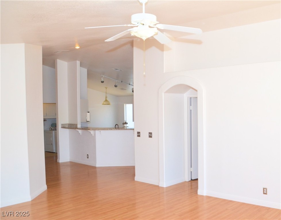 7340 Alpine Ridge Street Las Vegas, NV 89131 - Photo 11 of 36 Entry from the living room to the primary bedroom.