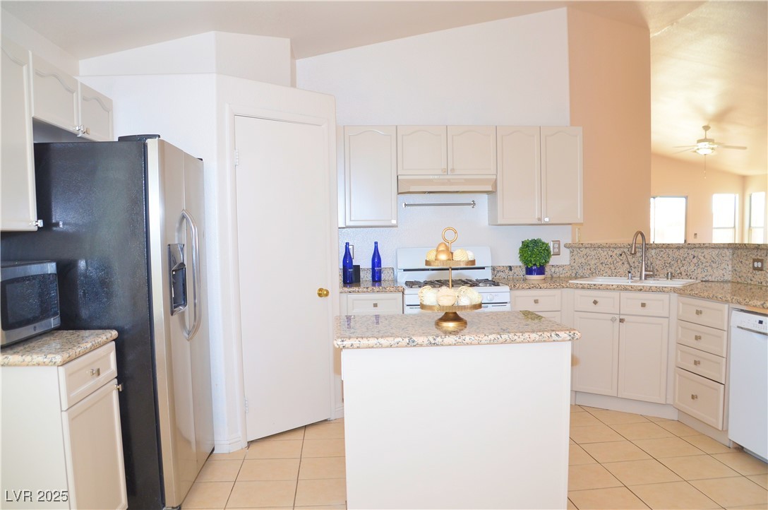 7340 Alpine Ridge Street Las Vegas, NV 89131 - Photo 6 of 36 Island for lots of counter space.