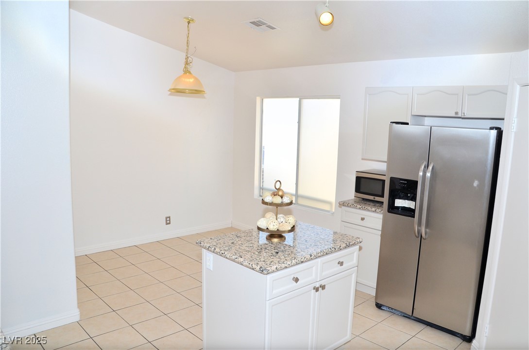 7340 Alpine Ridge Street Las Vegas, NV 89131 - Photo 7 of 36 In kitchen eating area