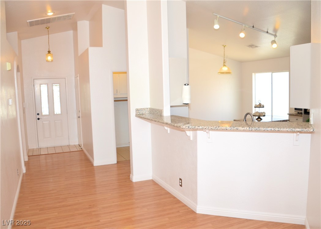 7340 Alpine Ridge Street Las Vegas, NV 89131 - Photo 10 of 36 High ceilings give open and airy feel throughout the home.