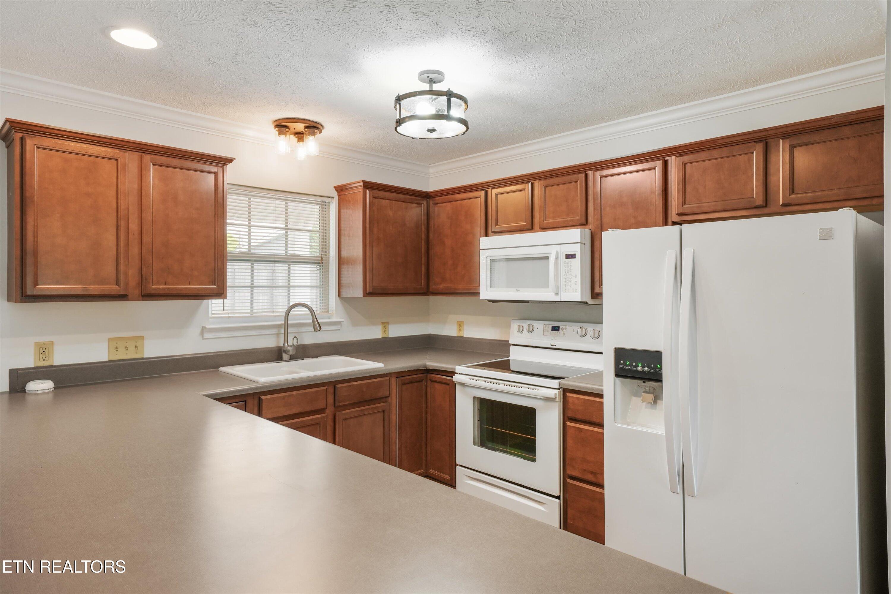 4516 Pleasant Ridge Road Knoxville, TN 37912 - Photo 8 of 24 4516-pleasant-ridge-kitchen-cabinets