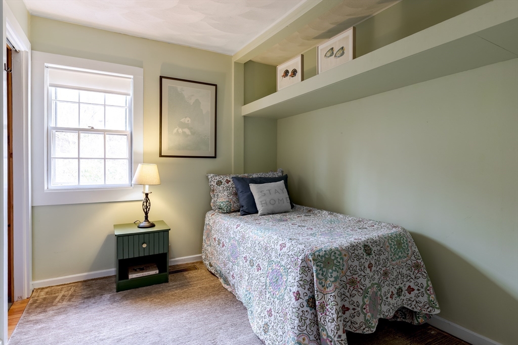 85 Colonial Drive Littleton, MA 01460 - Photo 12 of 26 a bedroom with a bed and a window