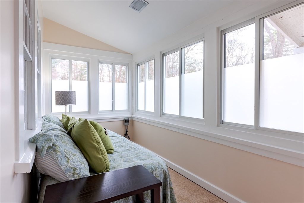 85 Colonial Drive Littleton, MA 01460 - Photo 13 of 26 a living room with furniture and a potted plant