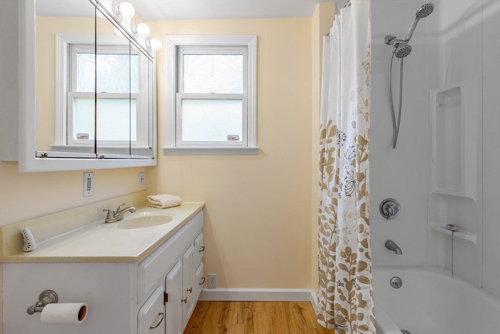 85 Colonial Drive Littleton, MA 01460 - Photo 15 of 26 a bathroom with a sink a vanity and a shower