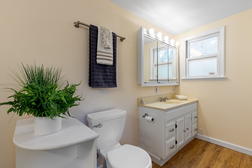 85 Colonial Drive Littleton, MA 01460 - Photo 16 of 26 a bathroom with a toilet sink and mirror