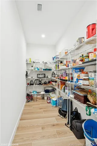 a view of storage and utility room